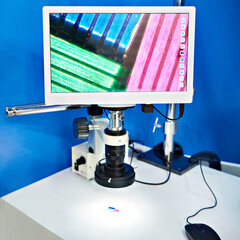 Microscope with camcorder and monitor