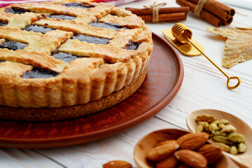 Close up of a berry tart pie on wooden table