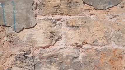 
An old damaged stone wall
