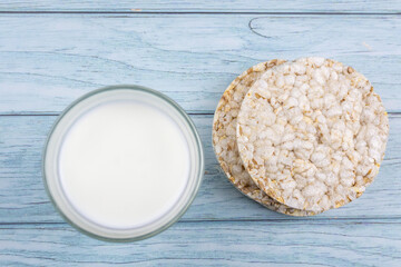 glass of milk with grain crispbreads