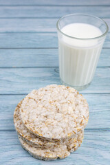 glass of milk with grain crispbreads