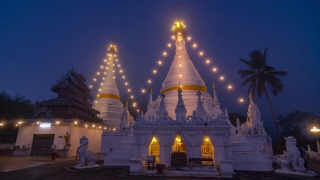 4K Time Lapse Video of Phra That Doi Kong Mu Temple is the sacred temple of Mae Hong Son province for a long time at night.