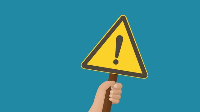 A hand holds up a warning sign, and then lowers it, on blue background