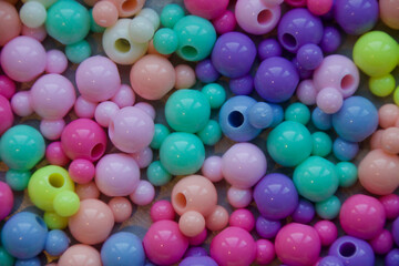 Cluster of coloured spheric-shaped beads.