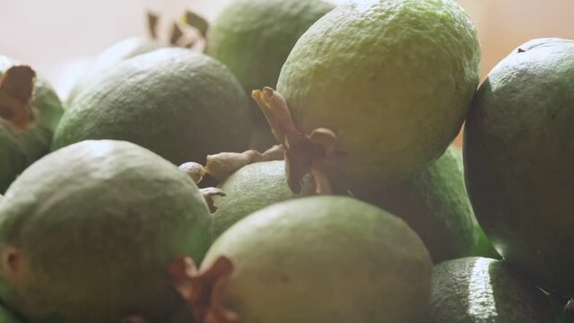 Ripe feijoa fruits on a tray
