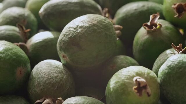 Ripe feijoa fruits on a tray
