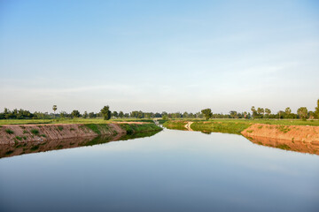 Fototapeta na wymiar landscape with a river and a pond