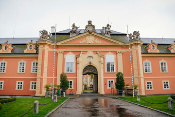 Obraz premium Rococo chateau with a distinguished facade, magnificent residence from the 18th century, castle Dobris in autumn, Central Bohemia, Czech Republic