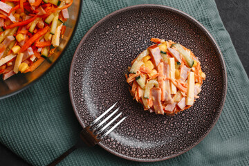 Korean carrot salad with ham, cucumber and corn. Top view, side view.
