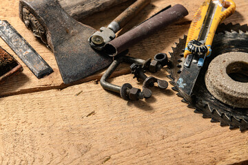 Old vintage household hand tools on a wooden background as frame and place for text