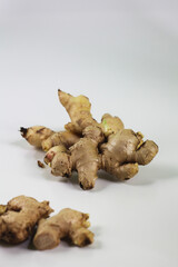 Jahe or Ginger roots one of spices use as cooking spices and herbal drink in Indonesia, Copy space on  isolated white background