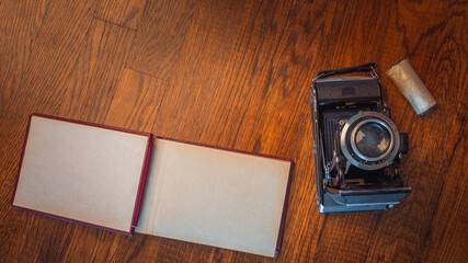 Notebook mock up for artwork with film camera Top view.