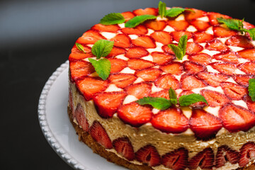 Amazing beautiful hand decorated homemade strawberry Fraisier cake. Tasty, fresh, appetizing...