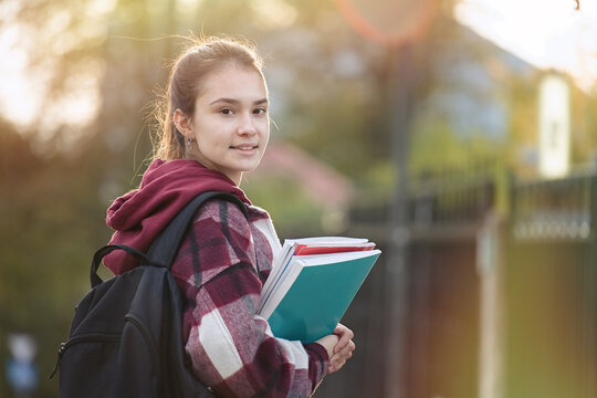 Cute Teenager Girl Going To School With Backpack. Students And Education, Young People At School