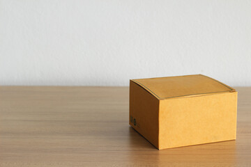 paper box on wooden table background