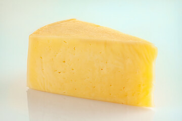 A piece of fresh cheese