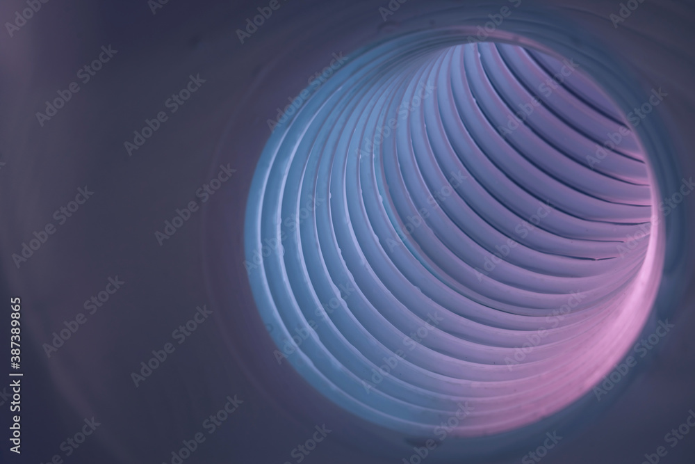 Poster beautiful round abstract white-gray tunnel with color light on a background pattern textured ford de
