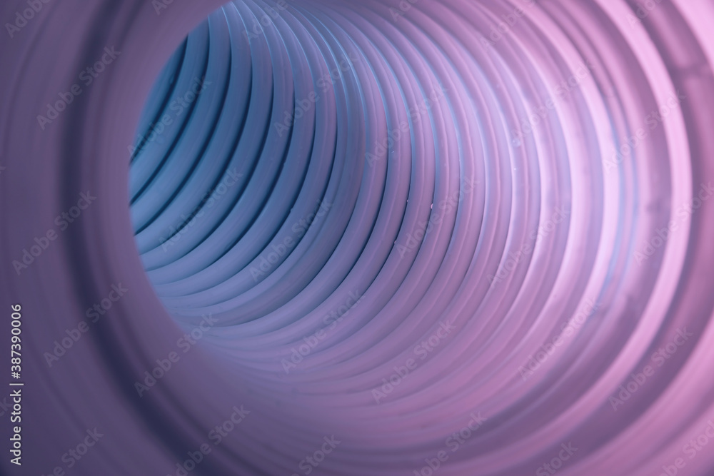 Poster Beautiful round abstract gray tunnel with color light on a background pattern textured ford design.