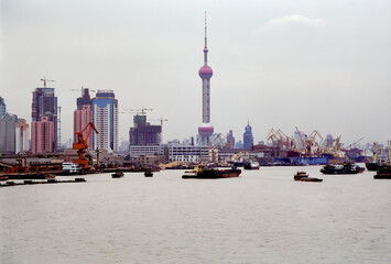 Shanghai, China - Oct 13, 1996: The Oriental Pearl tower and Pudong New Area, Shanghai in 1990s