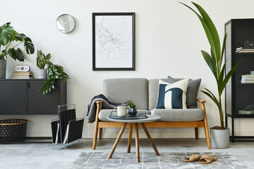 Modern retro concept of home interior with design grey sofa, coffee table, plants, furniture, mock...