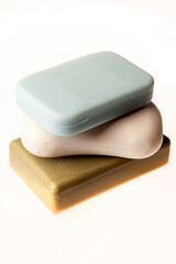 A stack of natural colorful soap isolated on white background. Studio shot. Hygiene theme - bacteria and virus prevention