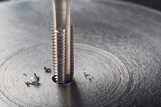 Thread tap. Tap drill steel billet. Working cutter.