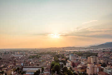 Fototapeta na wymiar Skyline of Brescia from the Castle at the sunset. Roman ancient castle. Lombardy region of Italy.