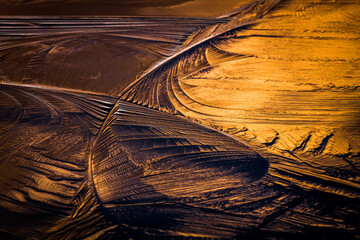 sunset colored textured first ice