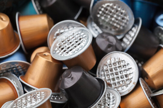 Waste coffee capsules, close-up photo