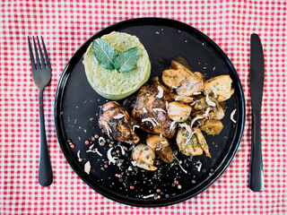 Roasted sleeves chicken with potatoes and barbecue sauce