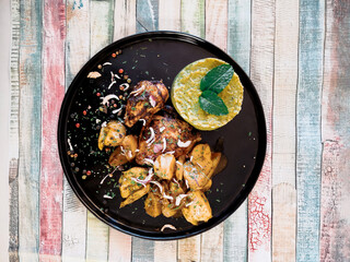 Roasted sleeves chicken with potatoes and barbecue sauce