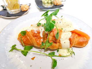 Delicious fresh croissant on table