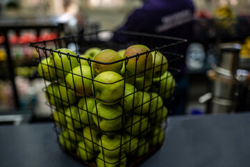fresh fruit juice on a rack in an iron basket