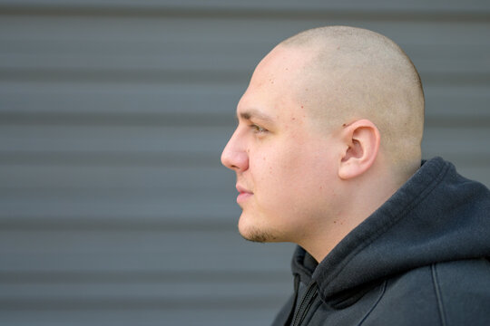 Profile Of A Modern Young Man With Shaved Head