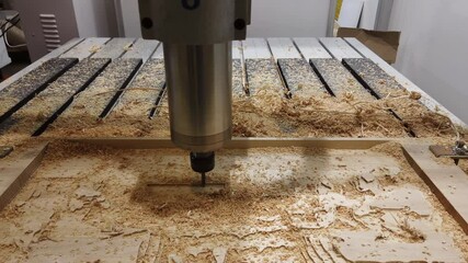 modern programmable woodworking machine grinds the part