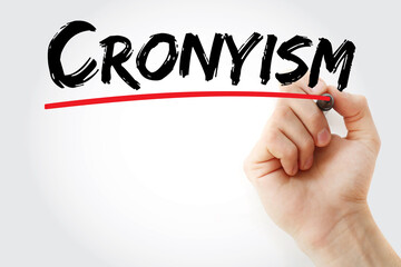 Cronyism text with marker, concept background