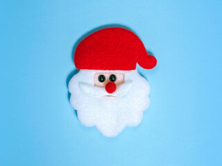 santa felt on a blue background
