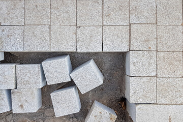Paving stones from large granite cubes.
