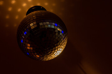 Obraz premium mirror ball on which the spotlight shines