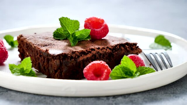 delicious chocolate brownie and raspberries