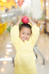 A cute little girl in the supermarket