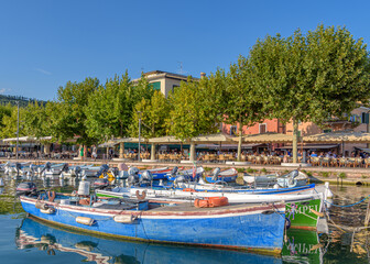 boats in the harbor. Marina in Garda town at Lake Garda in Italy