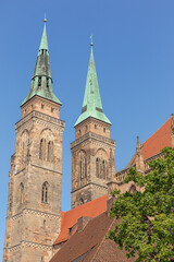 Fototapeta na wymiar The towers of the St. Sebaldus church seen from the City Hall Square in Nuremberg