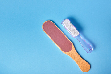 pedicure grater with wooden handle and pumice stone with plastic handle brush