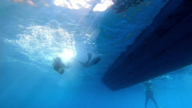 Scuba diver jumping from the boat