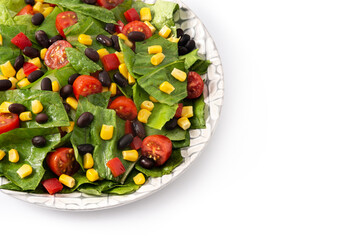 Mexican salad with black beans, corn,tomatoes,lettuce and pepper isolated on white background