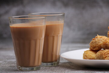 indian khari or kharee or salty Puff Pastry Snacks, served with indian hot tea.