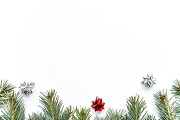 Christmas background. Branches of a Christmas tree on a white background. Top view.