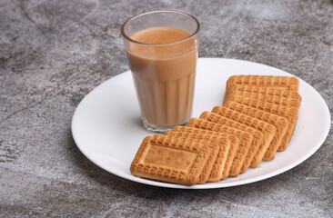 Cutting Chai, Traditional Desi Roadside tea of india with biscuits.