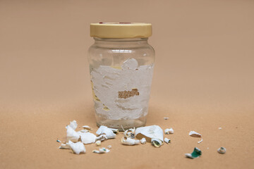 Removing sticky labels from glass jars. Hard to remove tags